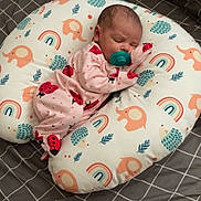 Olivia joined the competition — help win amazing prizes! baby, bed, bedroom, blanket, couch, crib, cushion, face, furniture, head, homedecor, indoors, infantbed, newborn, person, photography, pillow, portrait, quilt, sleeping