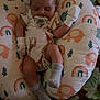 Olivia is registered to the contest to win money with this photo: baby, bed, blanket, clothing, couch, crib, cushion, face, furniture, glove, head, homedecor, hosiery, infantbed, newborn, person, photography, portrait, sleeping, sock