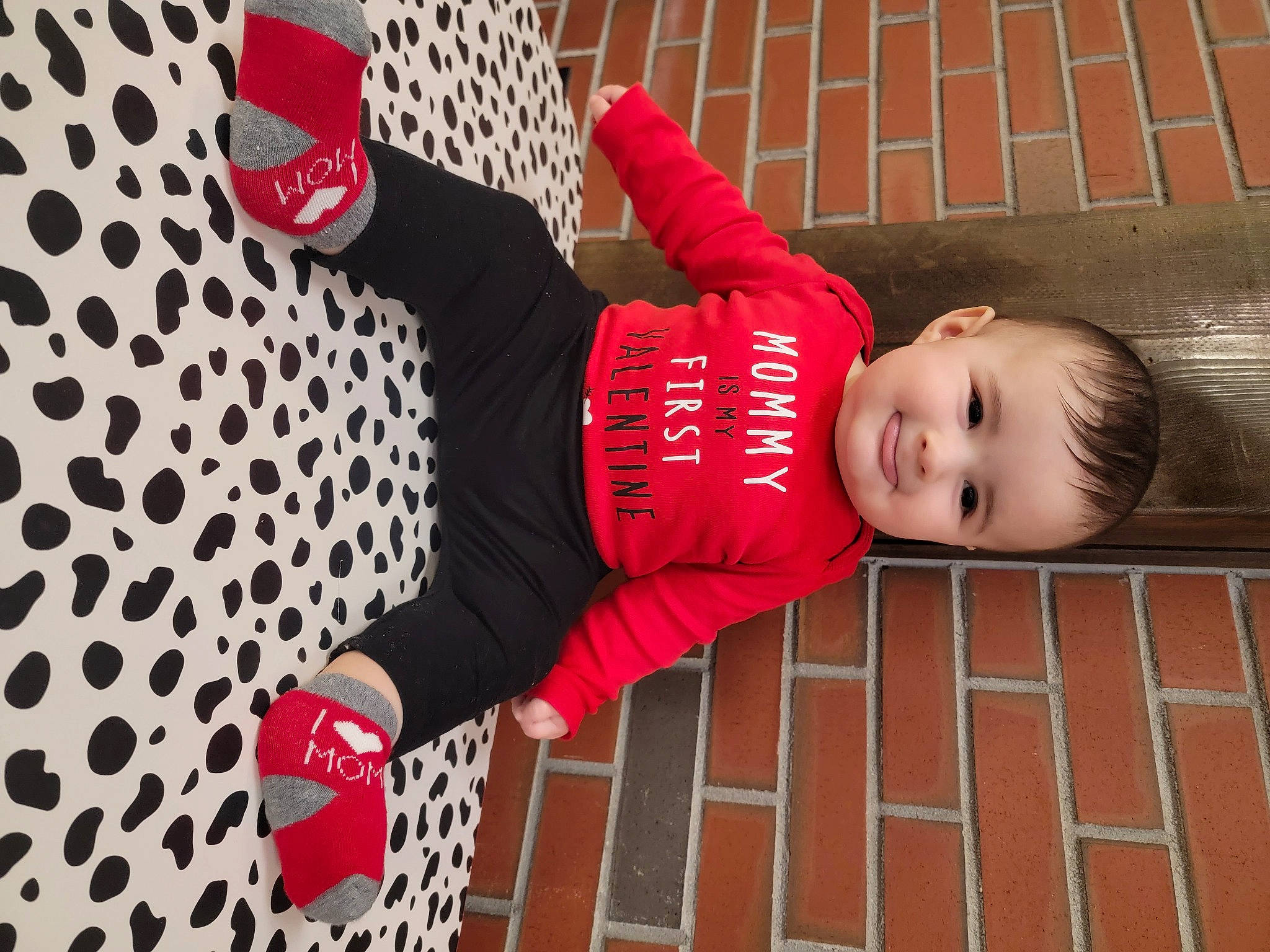 Zaidan is registered to the contest to win money with this photo: carmine, child, event, flash_photography, floor, flooring, fun, happy, hardwood, human_leg, joy, leg, mammal, mesh, pattern, person, product, red, smile, textile