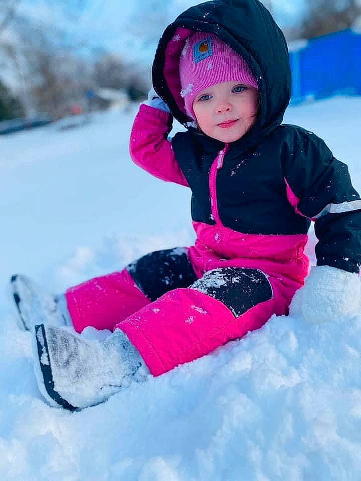 Amora joined the competition — help win amazing prizes! baby_toddler_clothing, child, face, freezing, fun, geological_phenomenon, happy, headgear, headwear, jacket, leisure, magenta, person, pink, playing_with_kids, recreation, sled, sledding, smile, snow