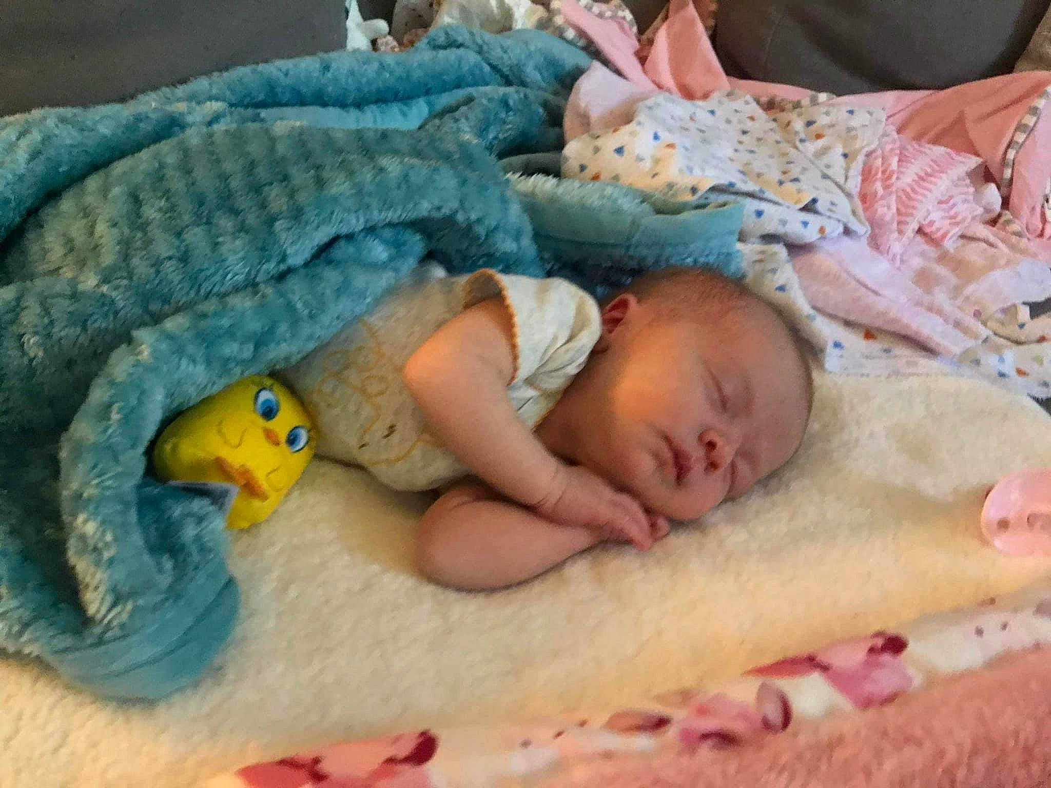 Wynter is registered to the contest to win money with this photo: art, baby, baby_products, baby_sleeping, baby_toddler_clothing, bed, bedding, bedtime, cheek, child, comfort, hand, head, linens, mouth, nap, person, room, skin, textile