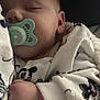 Elsie is registered to the contest to win money with this photo: baby, sleeping, pacifier, blanket, mickey_mouse, clothing, infant, hand, face, cozy, cute, child, soft, rest, comfort, young, peaceful, toddler, portrait, indoor