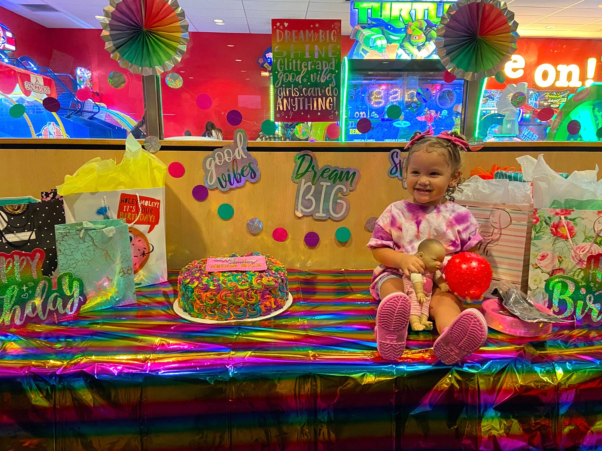 Kenna joined the competition — help win amazing prizes! art, baby, child, decoration, entertainment, event, fun, green, joy, leisure, magenta, party, person, pink, play, recreation, room, smile, table, toddler