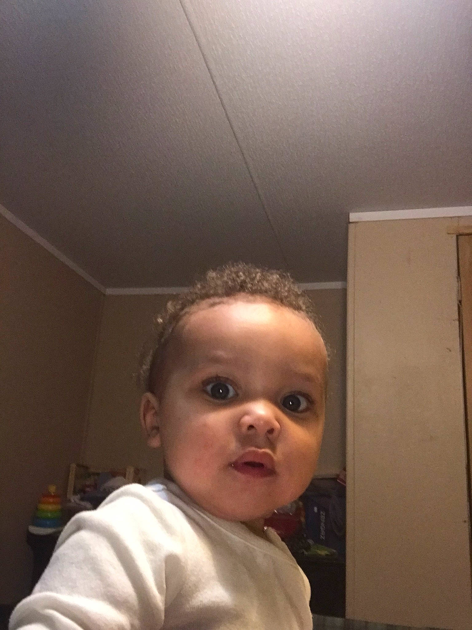 Jordan joined the competition — help win amazing prizes! baby, baby_toddler_clothing, ceiling, cheek, child, darkness, eyelash, facial_hair, flash_photography, flooring, fun, happy, head, lighting_accessory, nose, person, room, sitting, toddler, wood