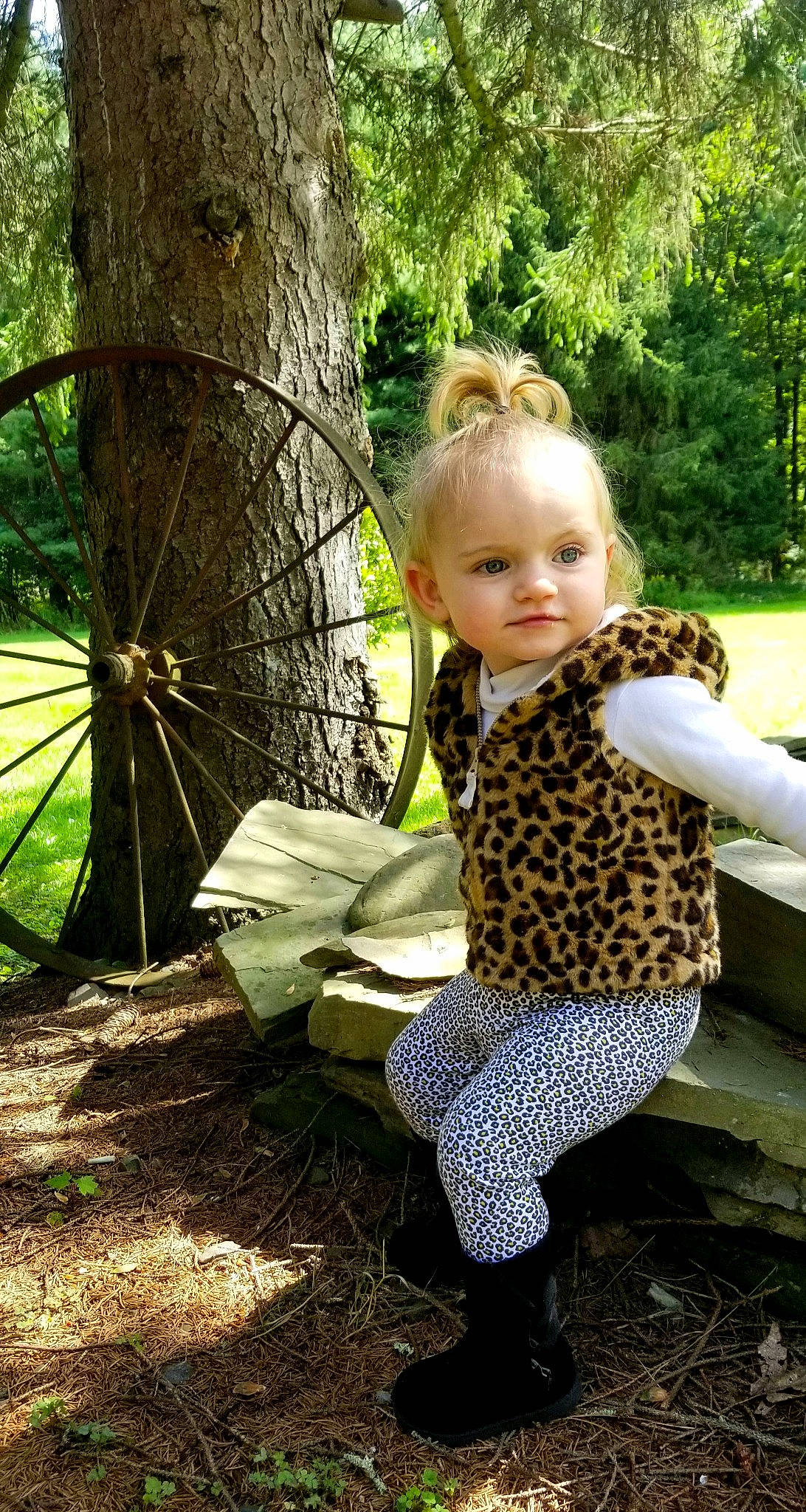 Adelin is registered to the contest to win money with this photo: child, child_model, fawn, pattern, person, plant, sitting, toddler, tree, woodland