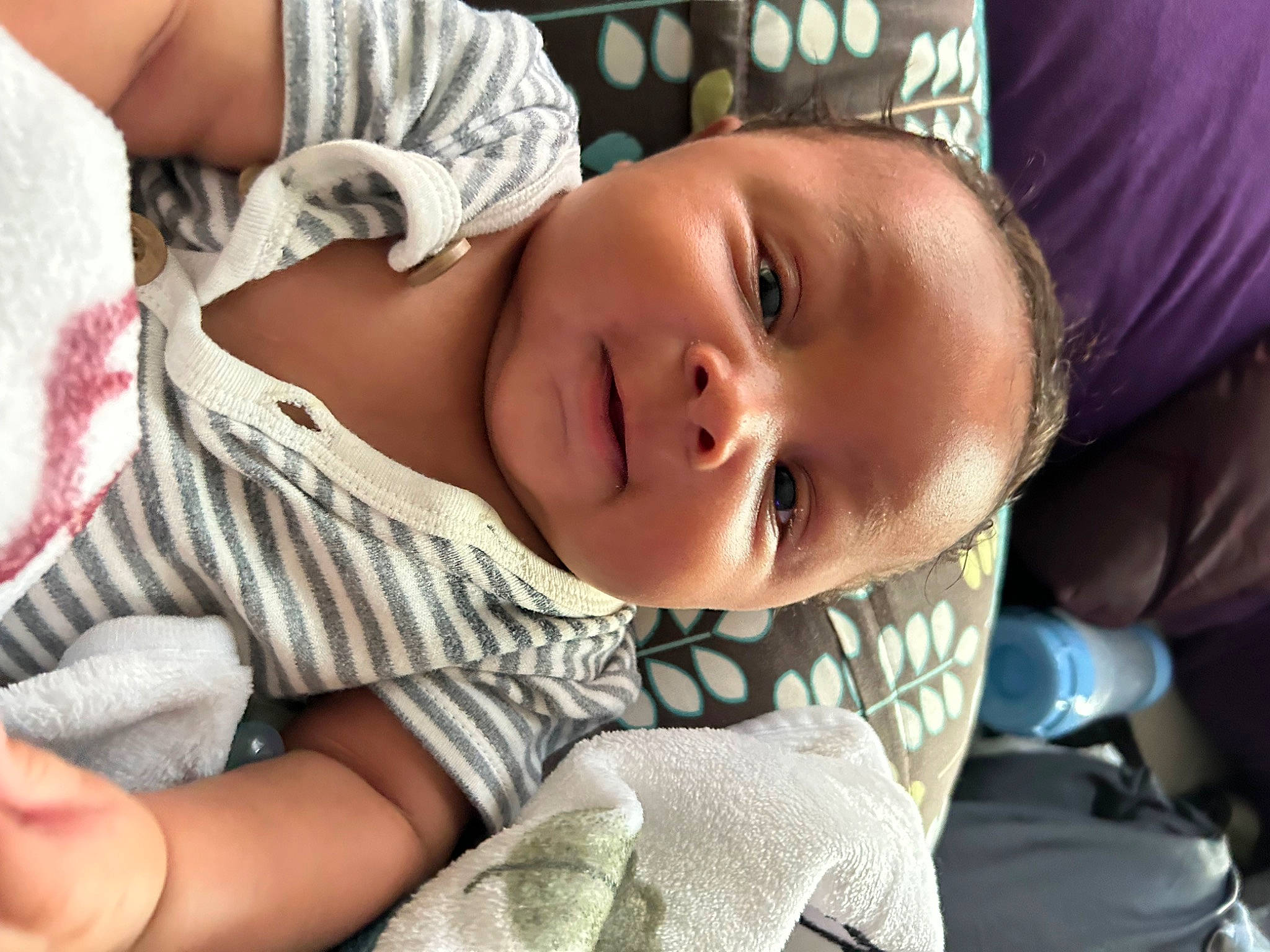 Jakari is registered to the contest to win money with this photo: baby, baby_products, baby_toddler_clothing, cheek, child, comfort, eyelash, grass, happy, linens, mouth, nose, pattern, person, room, sitting, skin, sleep, sleeve, toddler