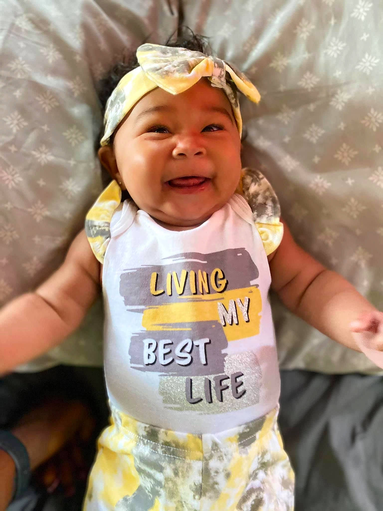 Leilanni joined the competition — help win amazing prizes! baby, baby_toddler_clothing, eye, face, finger, fun, gesture, goggles, happy, head, headgear, headwear, human_body, person, personal_protective_equipment, skin, sleeve, smile, sunglasses, toddler