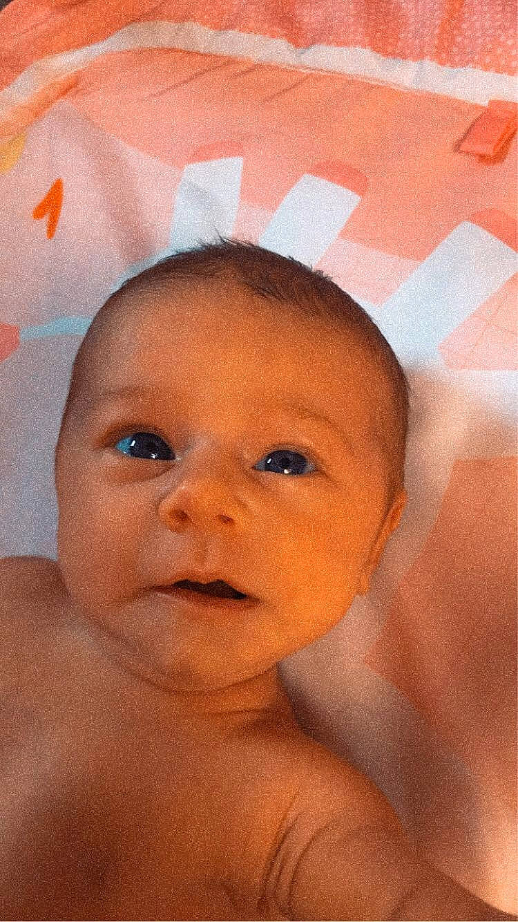 River is registered to the contest to win money with this photo: arm, cheek, chin, eye, eyebrow, eyelash, face, forehead, hairstyle, happy, head, human_body, iris, lip, mouth, neck, nose, person, skin, smile