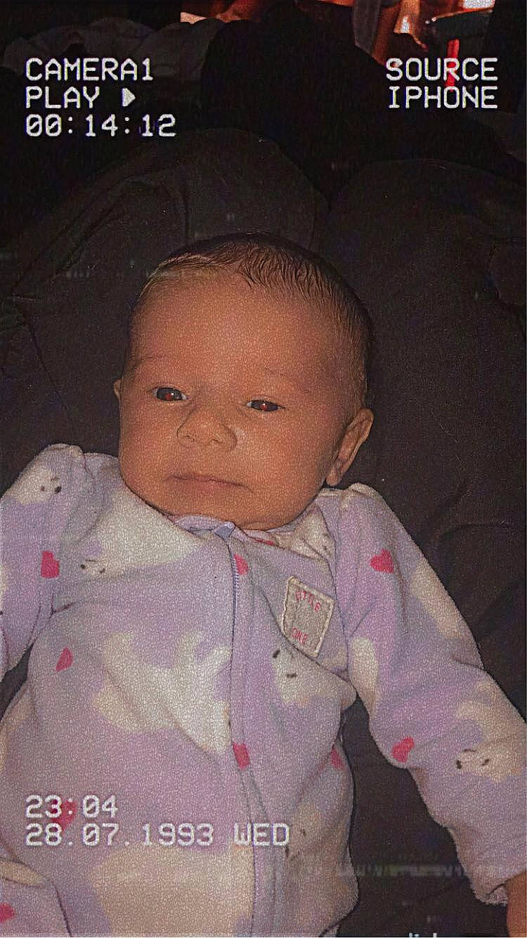 River is registered to the contest to win money with this photo: baby, baby_products, baby_toddler_clothing, cheek, child, chin, comfort, font, forehead, happy, human, lip, nose, pattern, person, photo_caption, product, skin, sleeve, toddler