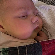 Ava is registered to the contest to win money with this photo: baby, sleeping, blanket, face, cheeks, soft, peaceful, closeup, rest, infant, skin, portrait, child, cuddly, warm, cozy, napping, head, young, cute
