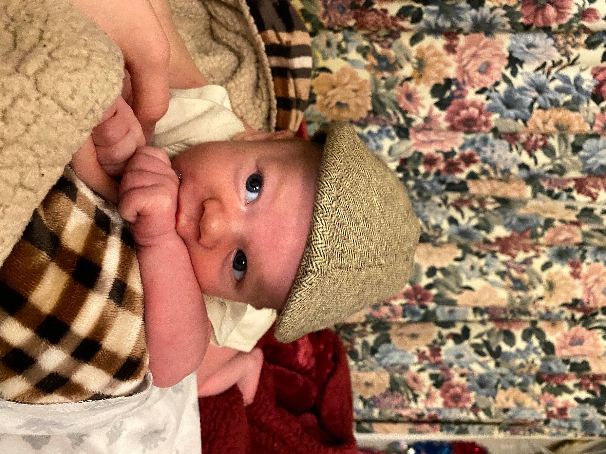 Franklin is registered to the contest to win money with this photo: baby, baby_toddler_clothing, cheek, eye, happy, hat, head, headgear, headwear, iris, lip, mouth, nose, pattern, person, plaid, skin, smile, tartan, textile