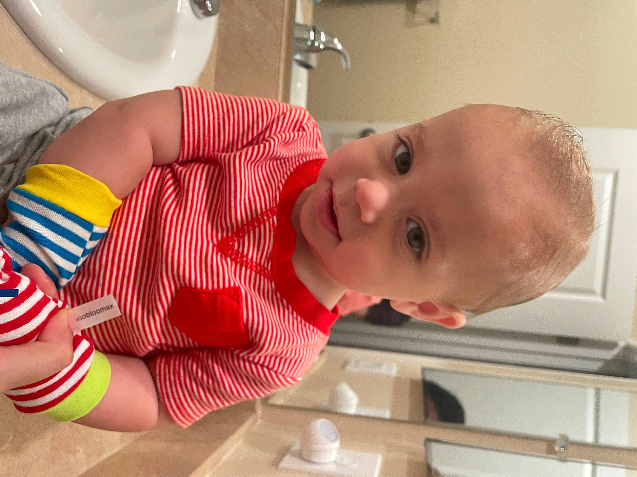 Connor joined the competition — help win amazing prizes! baby, carmine, child, elbow, face, facial_expression, flag_of_the_united_states, fun, human_leg, knee, mouth, nose, person, plaid, skin, smile, sock, standing, thigh, toddler