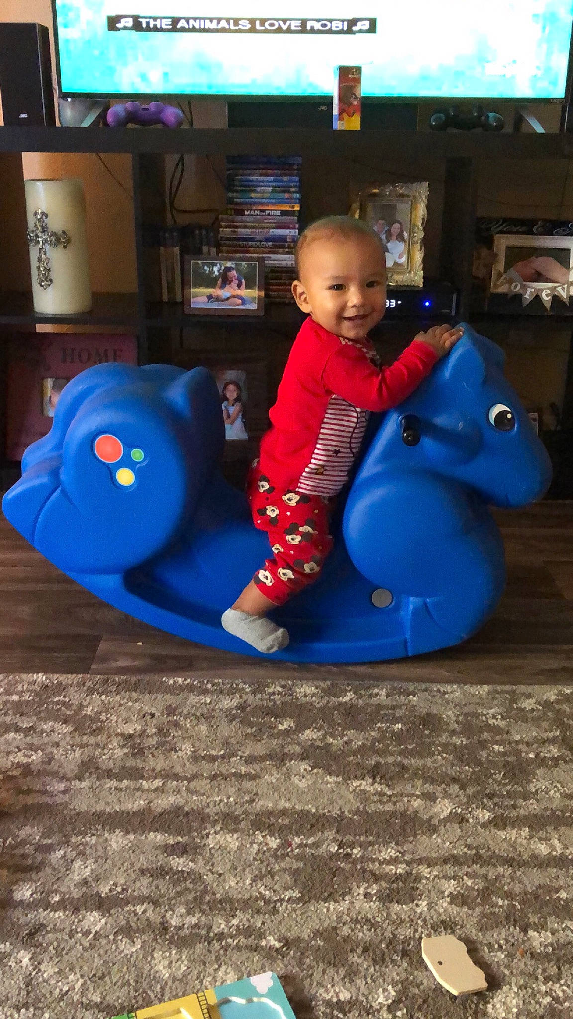 Osias is registered to the contest to win money with this photo: blue, child, day, fun, infant, joy, leisure, person, play, product, recreation, red, sitting, toddler, toy