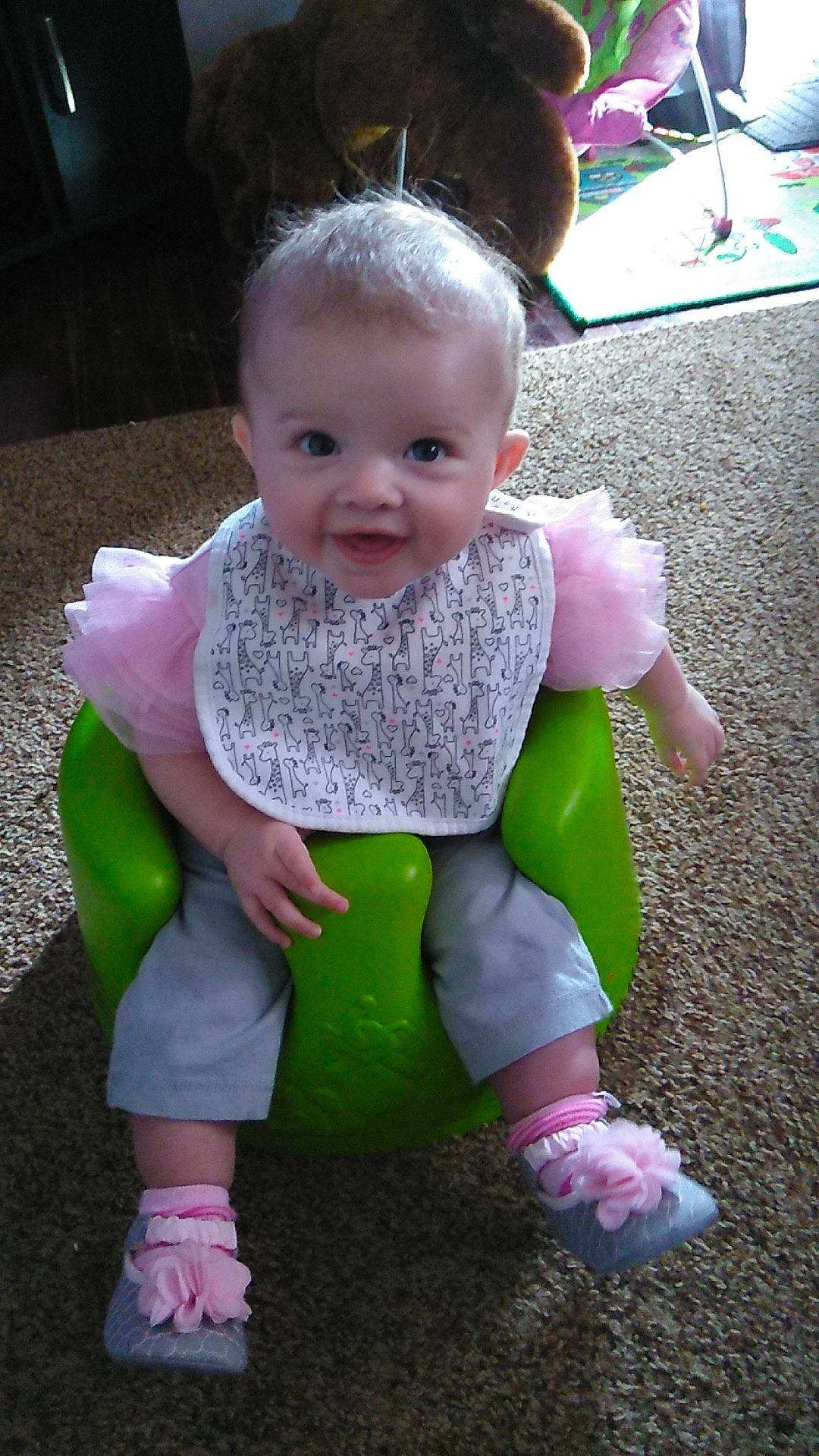 Kaya joined the competition — help win amazing prizes! baby_products, child, day, eye, fun, girl, grass, green, infant, iris, person, pink, play, product, sitting, skin, smile, standing, textile, toddler