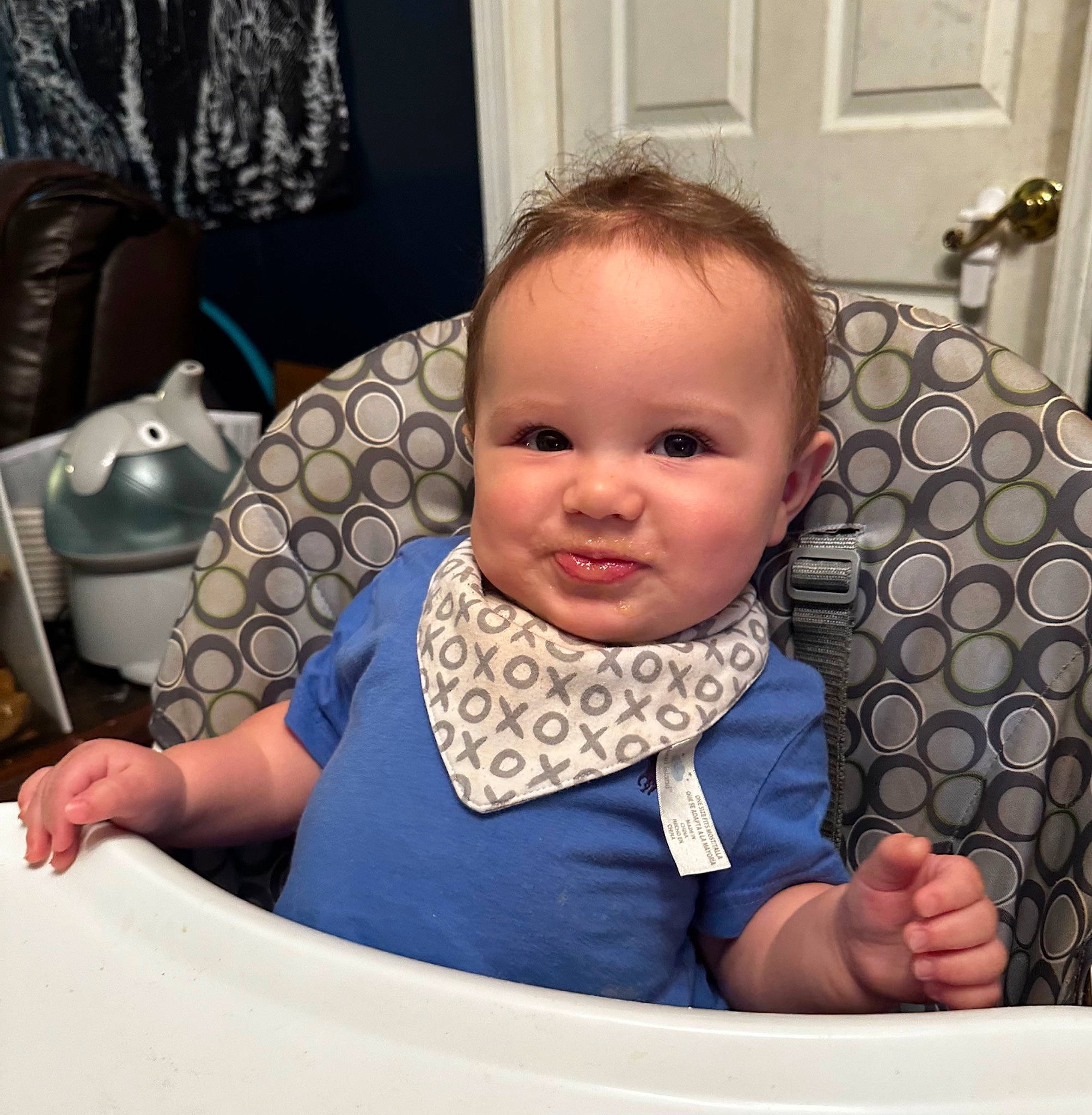 Malakai is registered to the contest to win money with this photo: arm, baby, baby_products, baby_toddler_clothing, car_seat, chair, cheek, child, comfort, curtain, happy, joy, metal, pattern, person, picture_frame, room, sitting, sleeve, smile