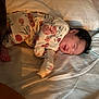 Paris joined the competition — help win amazing prizes! baby, sleeping, pajamas, floral_pattern, bed, blanket, infant, peaceful, soft_lighting, indoors, cute, child, face, hair, rest, comfort, cozy, young, person, sleep