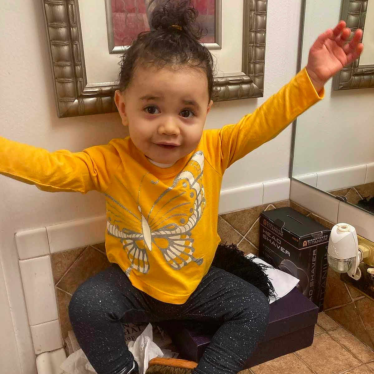 Amara joined the competition — help win amazing prizes! bathroom, boy, child, clothing, face, footwear, hair, head, indoors, jeans, male, pants, person, photography, portrait, room, shoe, sitting, sleeve, toilet