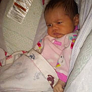 Paisley is registered to the contest to win money with this photo: baby, infant, blanket, onesie, pacifier, baby_seat, cushion, sleepwear, child, indoor, cozy, resting, newborn, cute, soft, portrait, small, young, face, hand