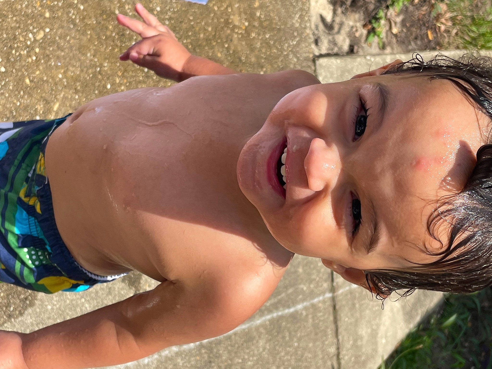 Abel is registered to the contest to win money with this photo: abdomen, barechested, black_hair, brassiere, chest, fun, grass, happy, human_leg, joy, leisure, muscle, navel, people_in_nature, person, smile, sun_tanning, swimwear, thigh, trunk