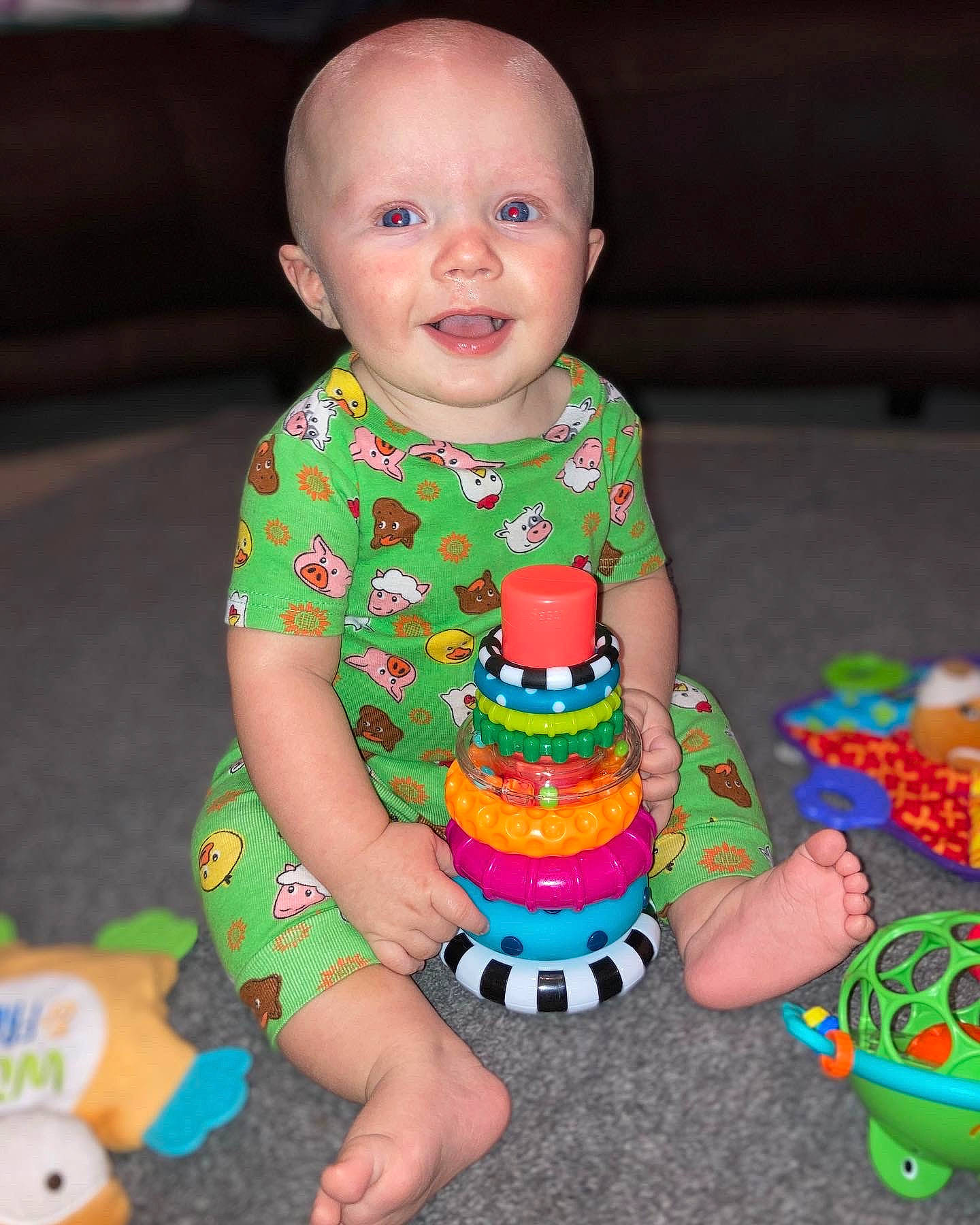 Waylon is registered to the contest to win money with this photo: baby, baby_products, baby_toddler_clothing, baby_toys, child, dress, event, fun, happy, pattern, person, plastic, play, product, sitting, skin, sleeve, smile, sweetness, toddler