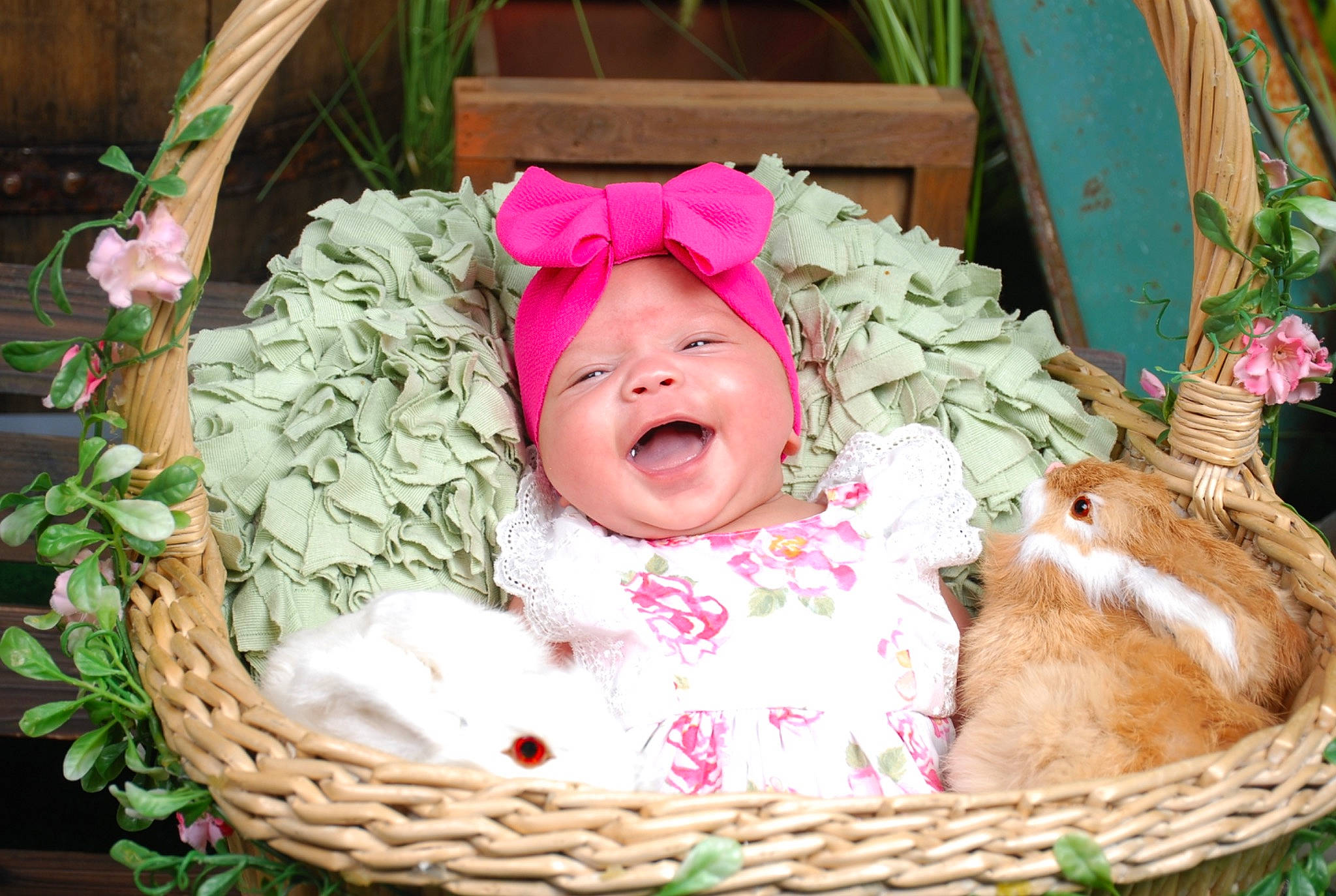 Charlotte is registered to the contest to win money with this photo: baby, baby_products, baby_toddler_clothing, baby_toys, basket, event, fashion_accessory, grass, happy, hat, headgear, headwear, person, pink, plant, product, smile, storage_basket, textile, toddler