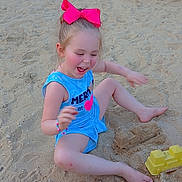 Luna joined the competition — help win amazing prizes! barefoot, beach, blue_dress, bow, castle, child, fun, girl, happy, joy, outdoor, playing, red_bucket, sand, sandcastle, shovel, smiling, summer, toy, yellow_chair