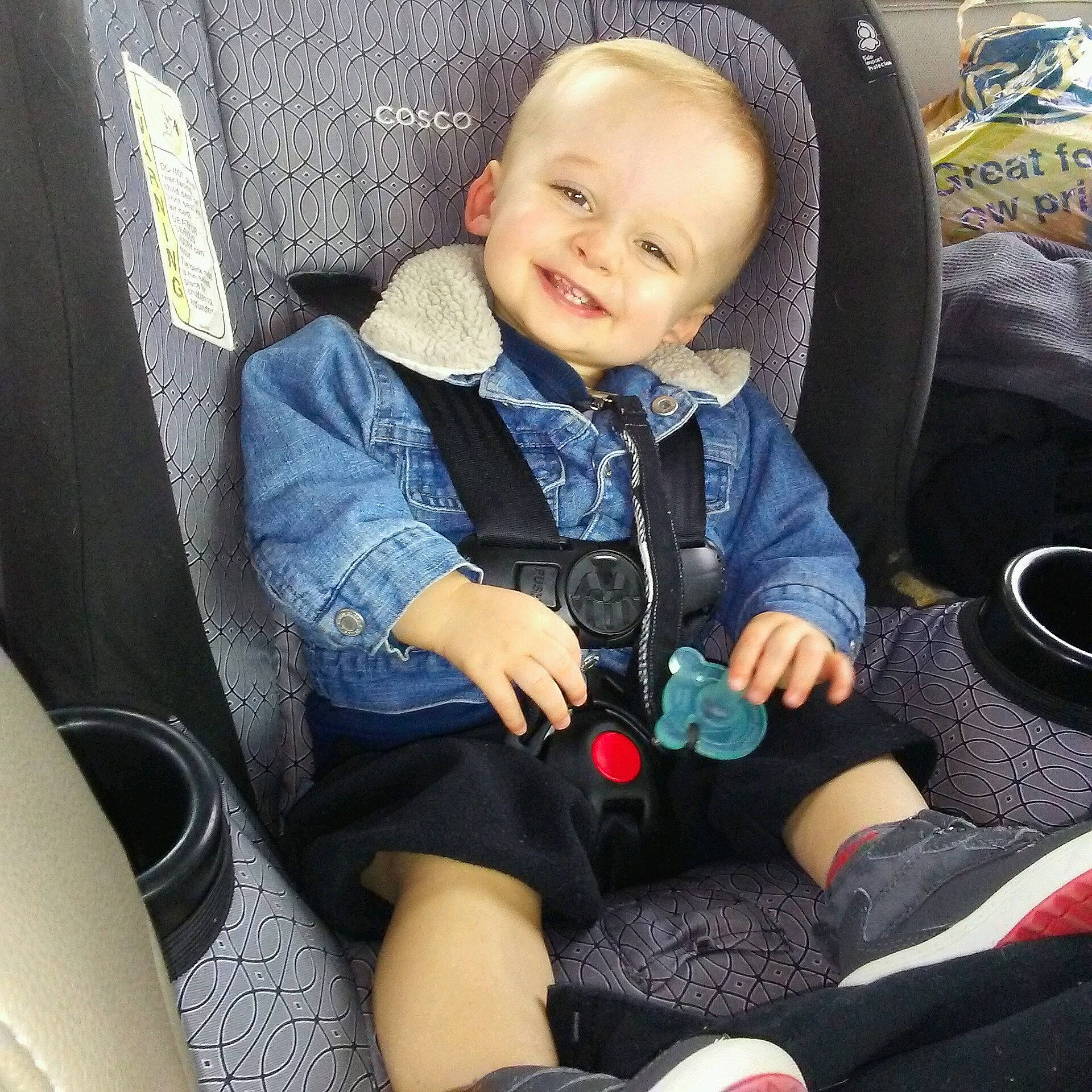Boone is registered to the contest to win money with this photo: auto_part, baby, baby_carriage, baby_in_car_seat, baby_products, car_seat, car_seat_cover, child, cool, family_car, joy, person, plant, play, product, seat_belt, sitting, steering_wheel, toddler
