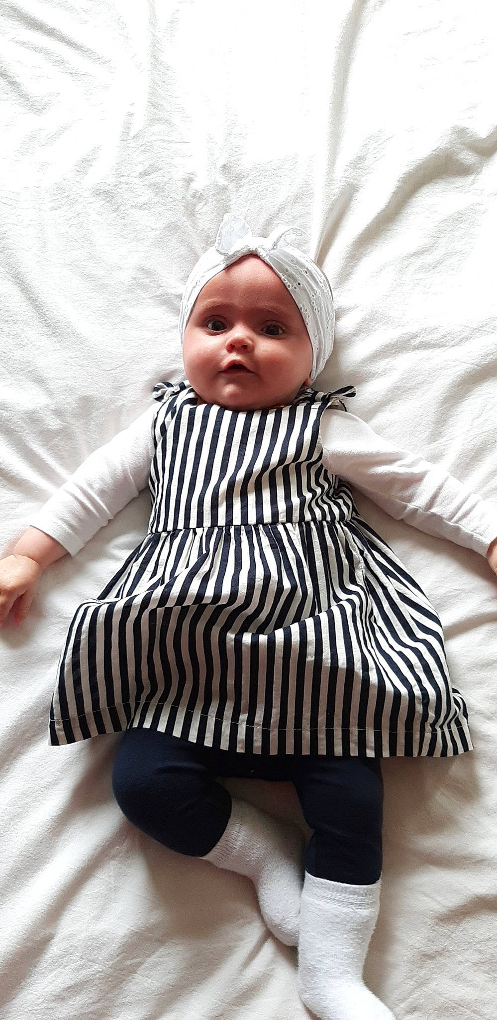 Lya participe au concours pour gagner de l'argent avec cette photo : baby, baby_toddler_clothing, beauty, cheek, child, comfort, eye, face, fashion_design, happy, human_body, monochrome_photography, one_piece_garment, pattern, person, photograph, sleeve, street_fashion, toddler, waist