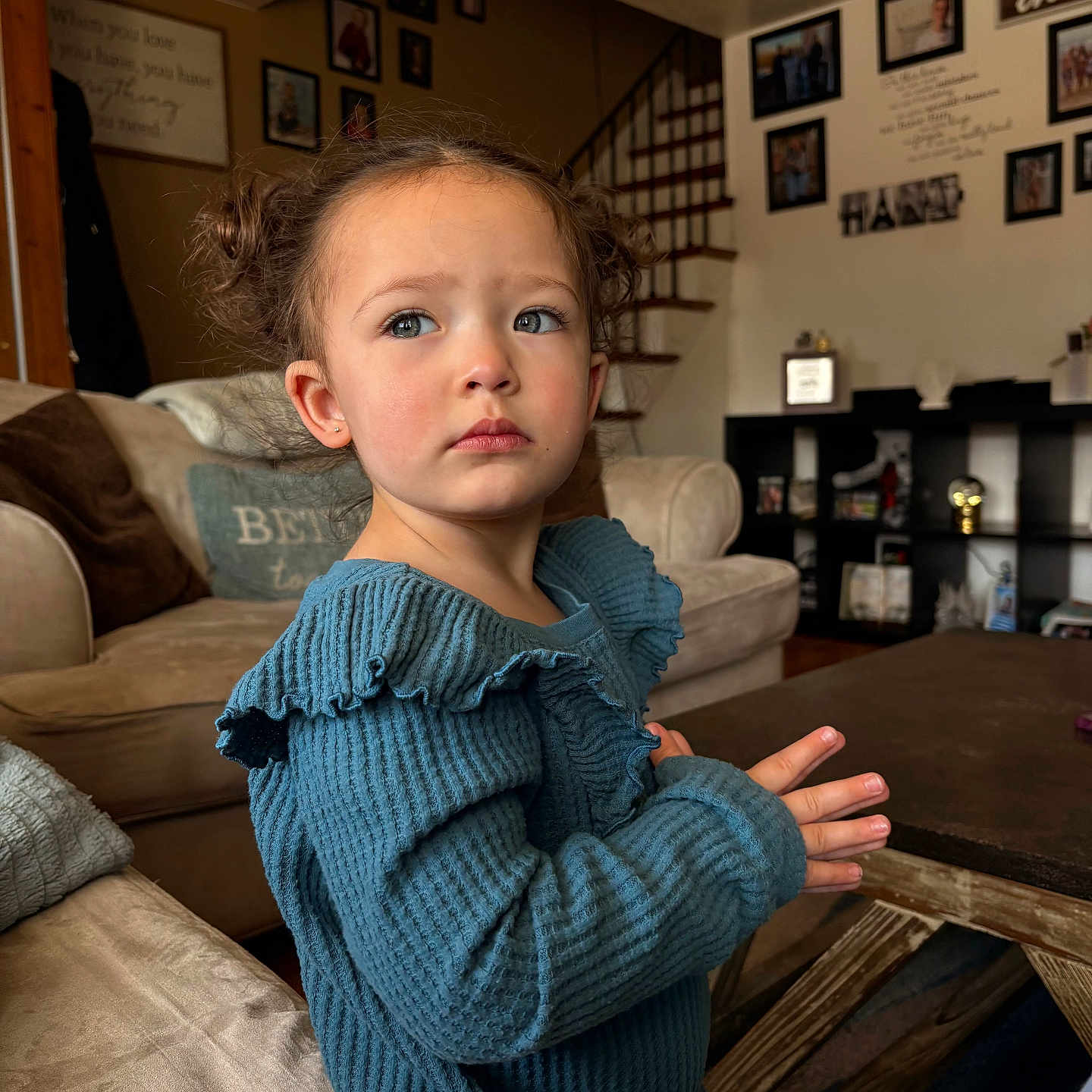 Brinlee joined the competition — help win amazing prizes! architecture, baby, bodypart, building, clothing, couch, face, finger, furniture, hand, head, indoors, knitwear, livingroom, person, photography, portrait, room, sitting, sweater