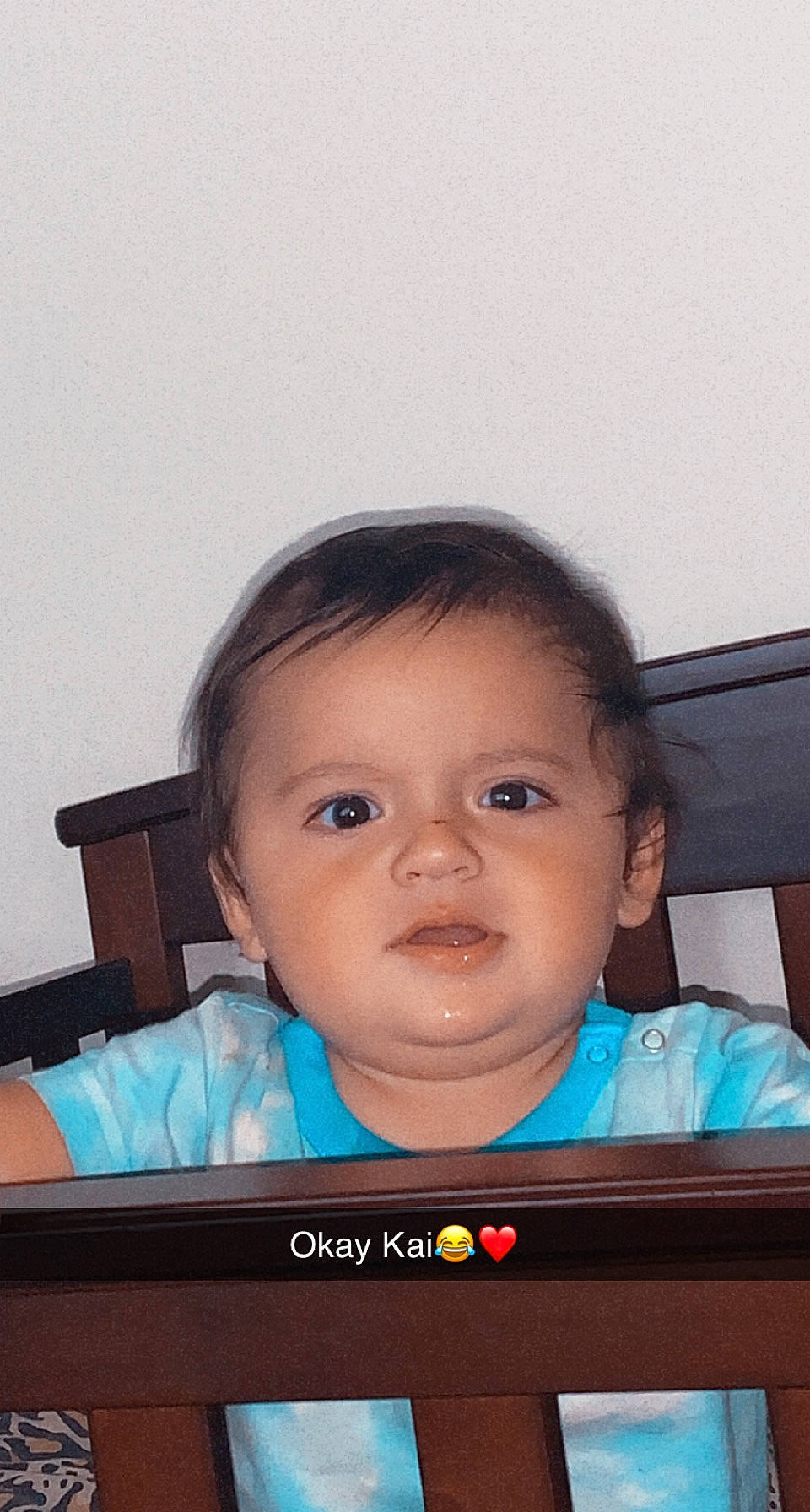 Kaizer is registered to the contest to win money with this photo: baby, cheek, child, chin, comfort, electronic_device, eyebrow, eyelash, flash_photography, fun, hairstyle, happy, iris, nose, person, product, sitting, skin, technology, toddler