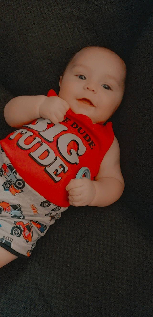 Johnnylee joined the competition — help win amazing prizes! baby, baby_products, baby_toddler_clothing, carmine, cheek, child, finger, font, fun, gesture, hand, happy, logo, nail, neck, person, sleeve, smile, t_shirt, thumb