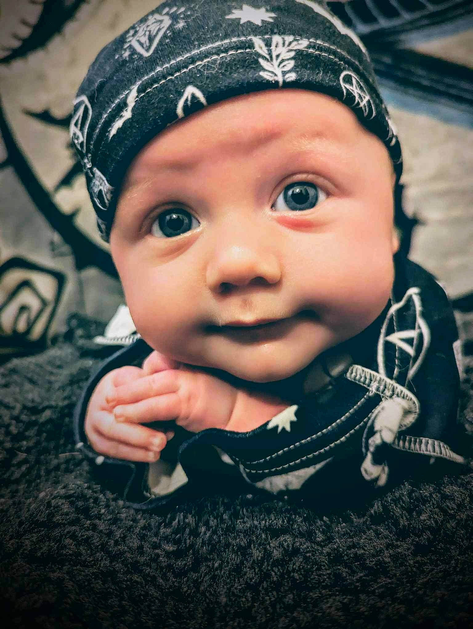 Jordan joined the competition — help win amazing prizes! baby, baby_toddler_clothing, cap, cheek, child, eye, eyebrow, fashion_accessory, flash_photography, fun, gesture, happy, hat, head, headgear, headwear, iris, knit_cap, person, skin