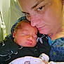 Harley is registered to the contest to win money with this photo: newborn, baby, person, cuddle, sleeping, blanket, close_up, indoor, love, family, portrait, comfort, skin, head, face, expression, clothing, warmth, intimacy, care