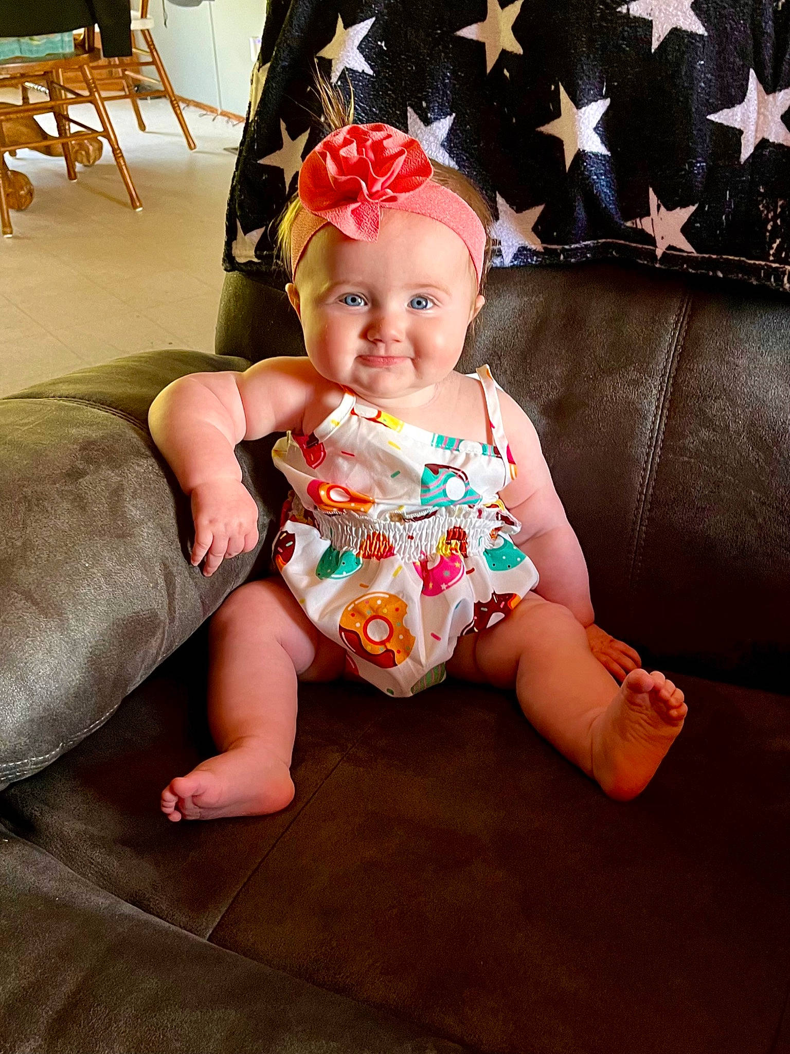 Wrenley is registered to the contest to win money with this photo: baby, baby_toddler_clothing, chair, child, costume_hat, event, fashion_accessory, foot, fun, happy, headpiece, headwear, holiday, human_leg, joy, pattern, person, pink, sitting, sleeve