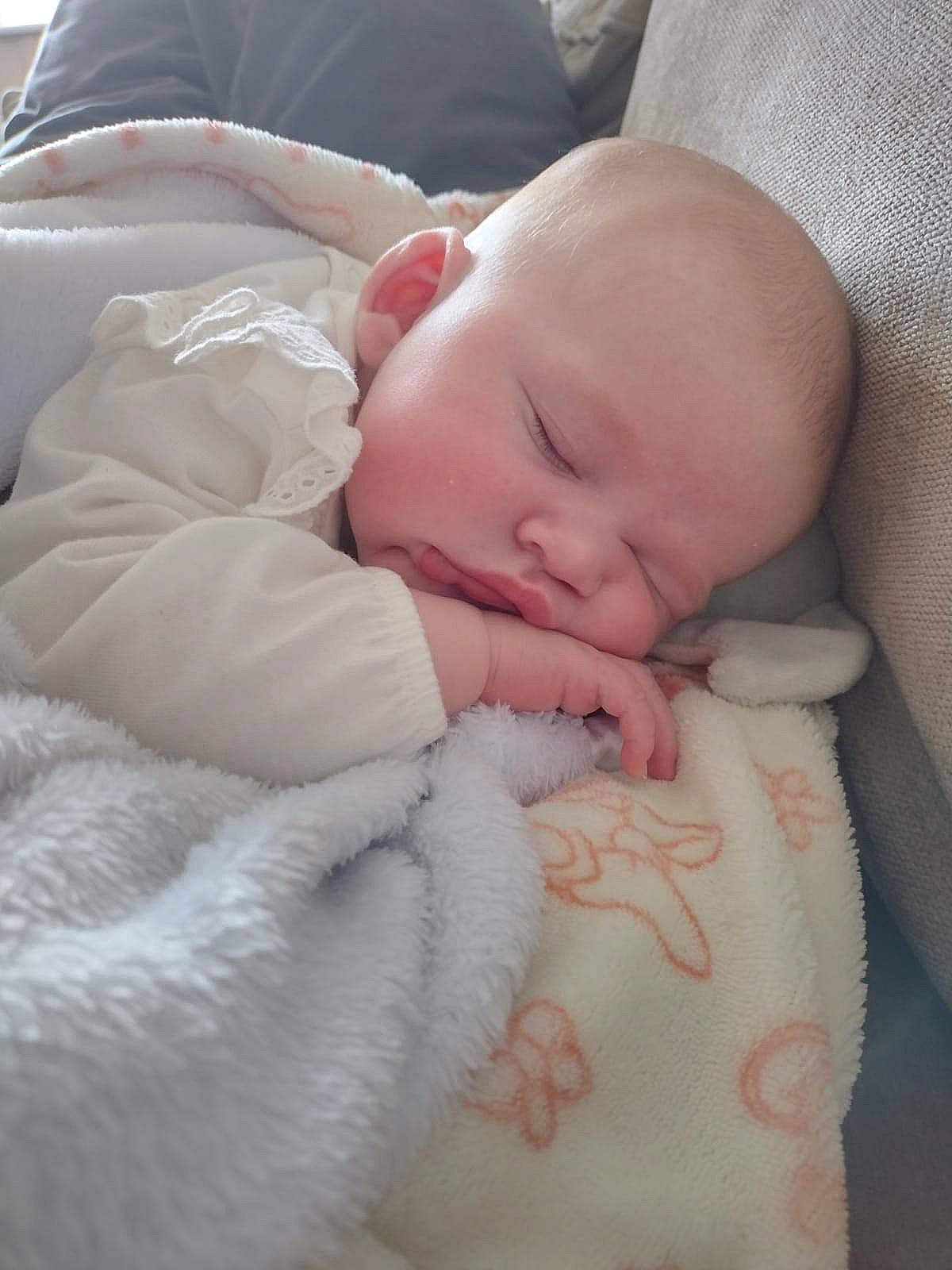 Liv is registered to the contest to win money with this photo: baby, baby_sleeping, baby_toddler_clothing, bedtime, cheek, child, chin, comfort, eye, flesh, fur, linens, nap, peach, person, skin, sleep, sleeve, toddler