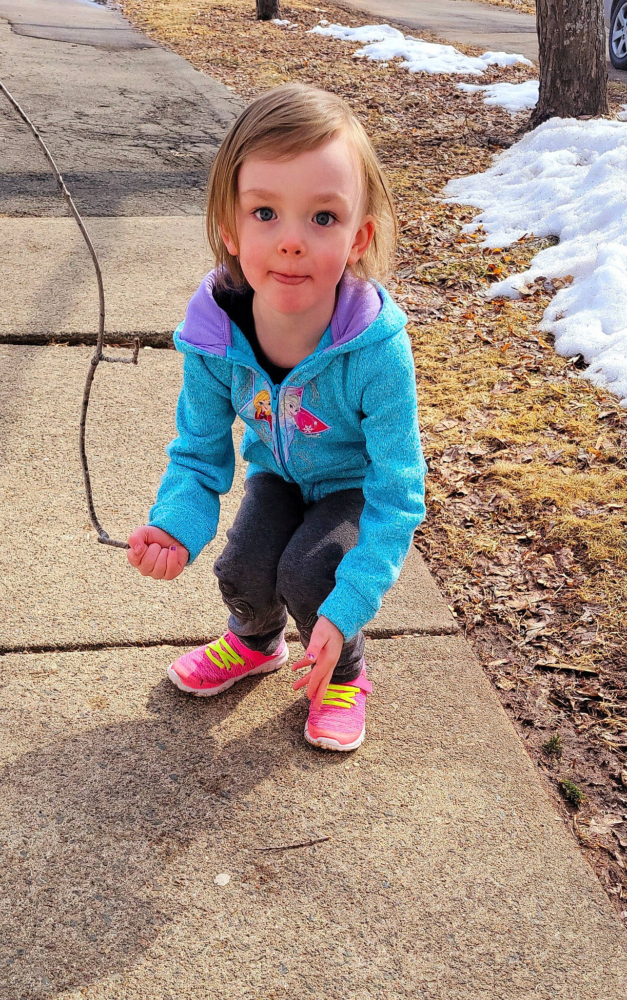 Kira is registered to the contest to win money with this photo: baby_toddler_clothing, child, electric_blue, eye, face, fun, grass, hair, happy, head, human_body, jacket, leg, leisure, people_in_nature, person, recreation, standing, toddler, tree