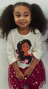 Noemí joined the competition — help win amazing prizes! black_hair, brown_hair, cheek, child, child_model, eyebrow, fun, hair, hairstyle, head, human, joy, lip, long_hair, nose, person, sleeve, smile, t_shirt, thumb