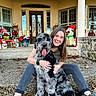Rye joined the competition — help win amazing prizes! woman, dog, smiling, outdoor, steps, front_porch, holiday_decorations, plants, flowers, boots, casual_clothing, stone_wall, leaves, tongue_out, happy, hugging, long_hair, window, door, festive