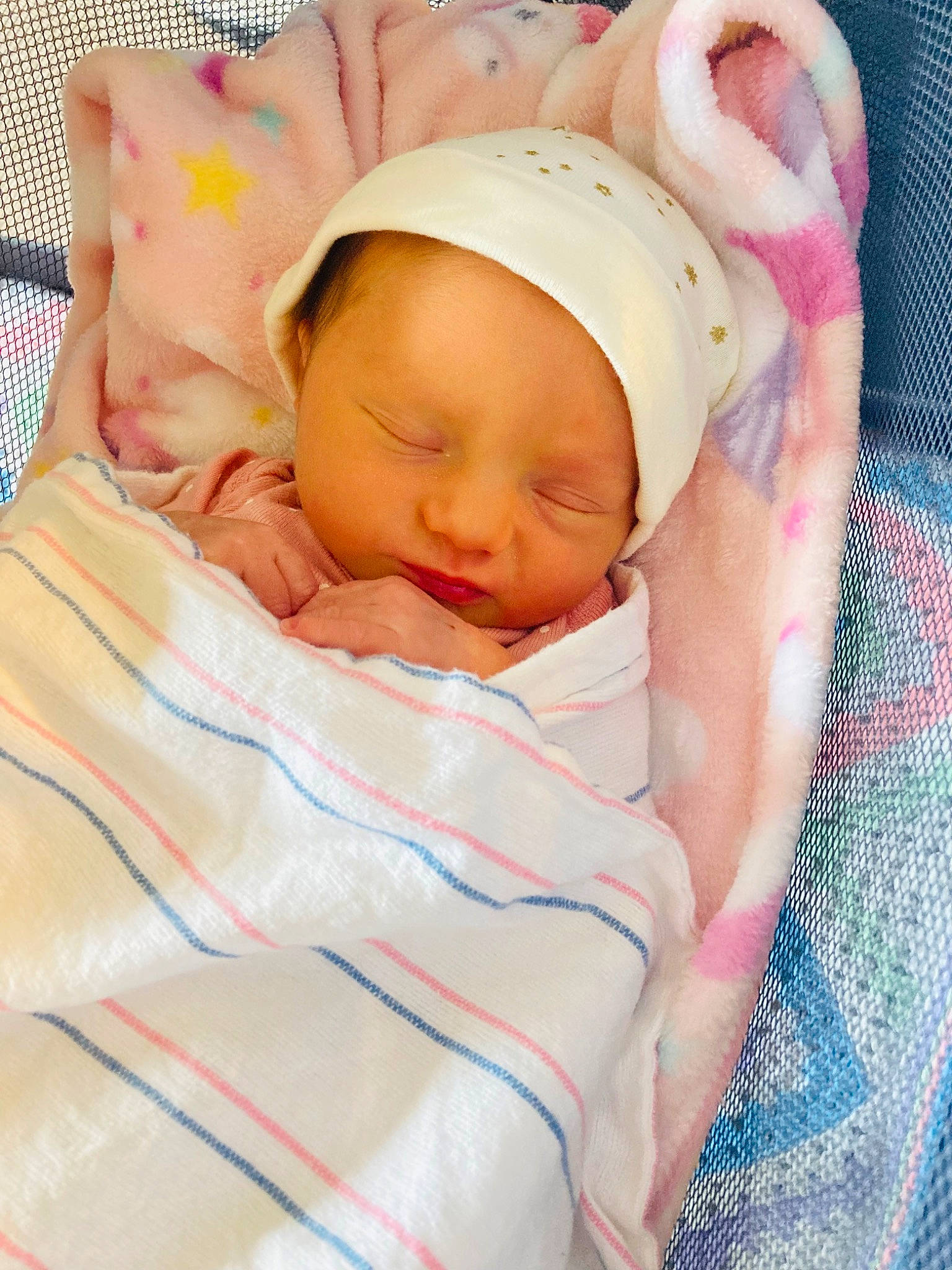 Joy joined the competition — help win amazing prizes! baby, baby_products, baby_sleeping, baby_toddler_clothing, beanie, bedtime, cap, cheek, child, comfort, eye, face, hat, linens, lip, nap, peach, person, pink, skin