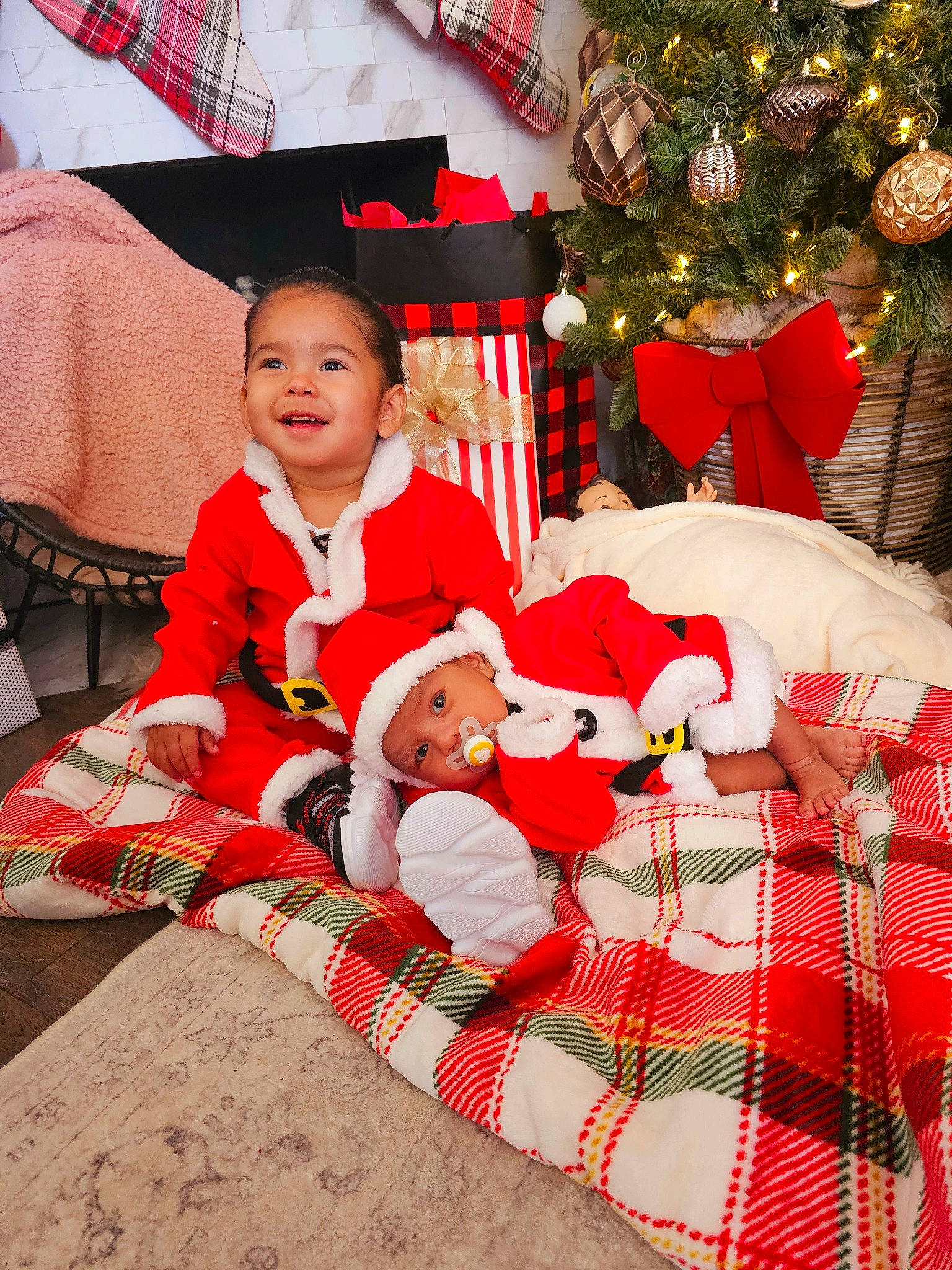 Asher joined the competition — help win amazing prizes! christmas, christmas_decoration, christmas_eve, christmas_ornament, christmas_tree, event, happy, headwear, holiday, holiday_ornament, joy, lap, ornament, pattern, person, plaid, red, room, tartan, textile