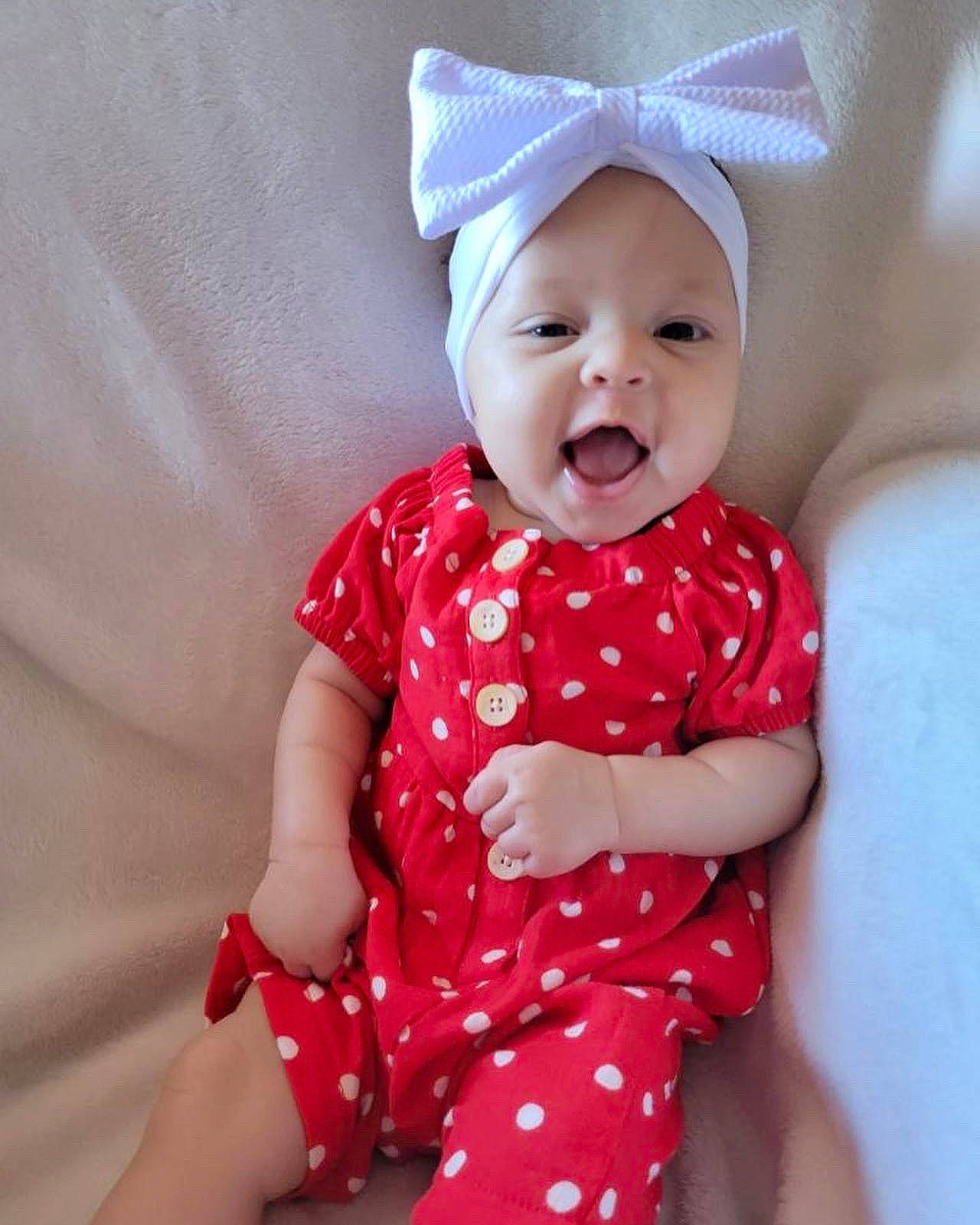 Journie joined the competition — help win amazing prizes! baby, baby_toddler_clothing, child, collar, comfort, day_dress, face, facial_expression, fun, happy, headwear, magenta, one_piece_garment, pattern, peach, person, pink, skin, sleeve, smile