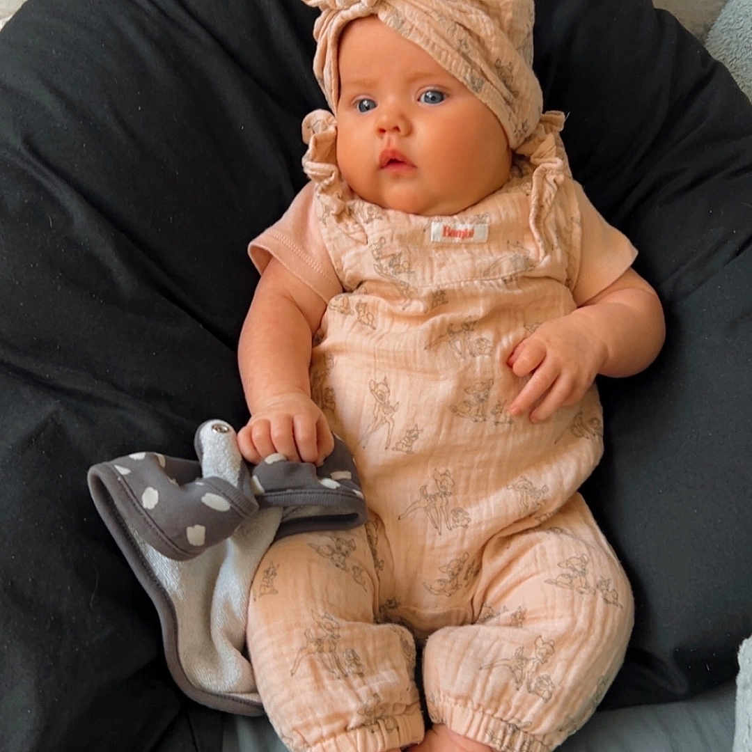 Cora-Leigh joined the competition — help win amazing prizes! baby, bed, blanket, blue_eyes, child, chubby_cheeks, clothing, comfort, cushion, cute, foot, hand, indoor, infant, peach, portrait, relaxed, sitting, soft_toys, turban