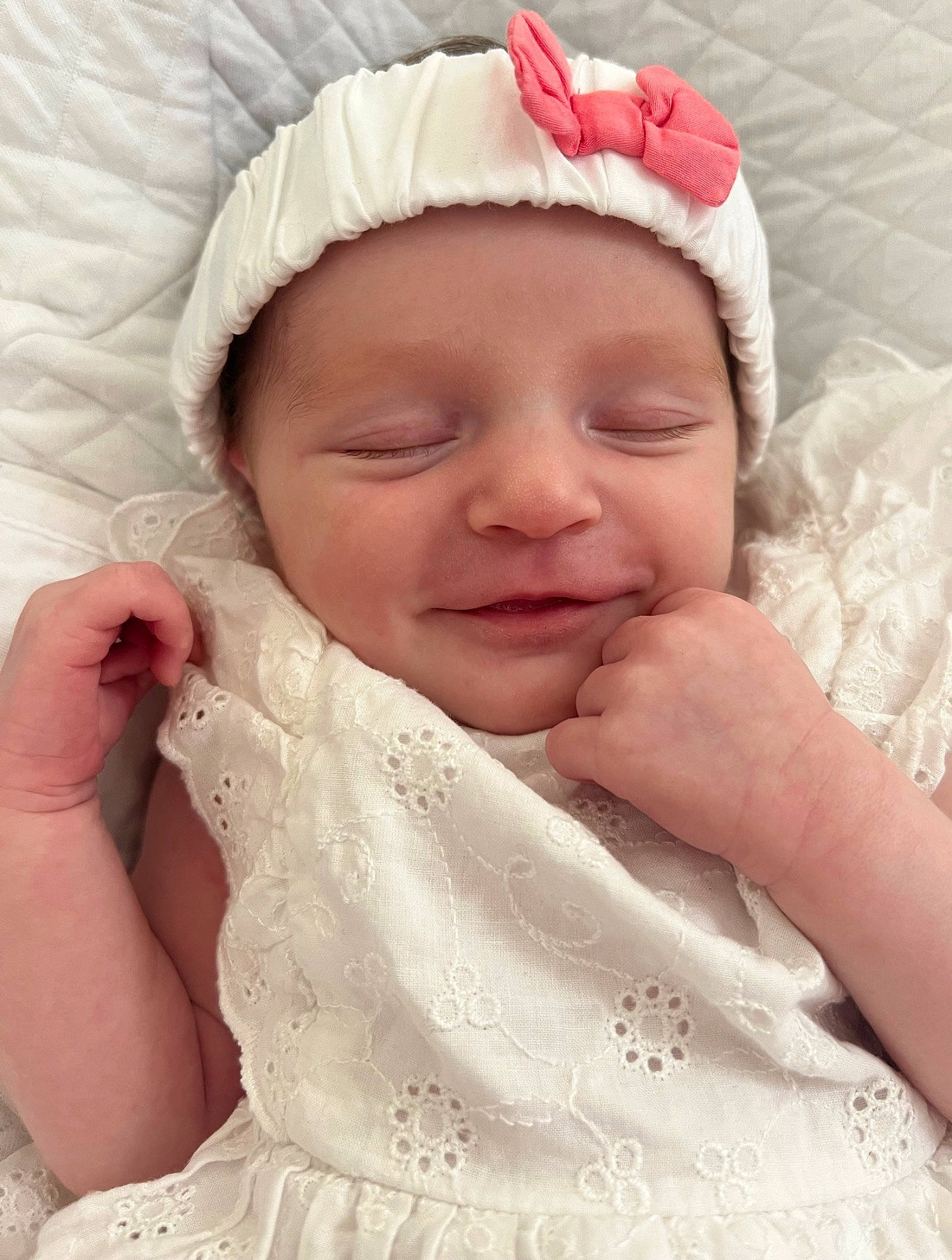 Ninon participe au concours pour gagner de l'argent avec cette photo : baby, baby_toddler_clothing, cheek, chin, comfort, eyebrow, face, finger, gesture, happy, headgear, headwear, lip, nose, person, pink, skin, sleeve, smile, thumb