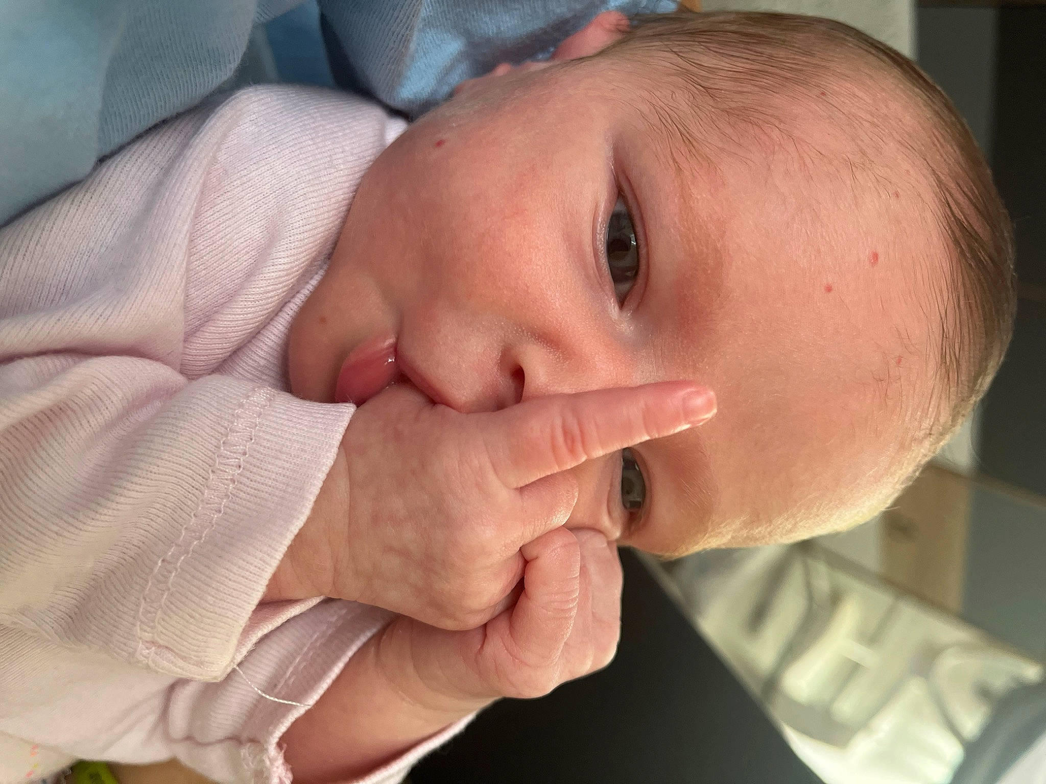 Ninon a rejoint le concours — aidez-le/la à gagner de superbes lots ! baby, baby_toddler_clothing, cheek, child, close_up, comfort, ear, eyelash, finger, gesture, happy, lip, nail, nose, person, skin, sleeve, smile, thumb, toddler