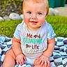 baby, bib, blanket, blue_eyes, child, clothing, cute, daylight, face, grass, hands, happy, nature, outdoor, portrait, red_hair, sitting, skin, smile, toddler