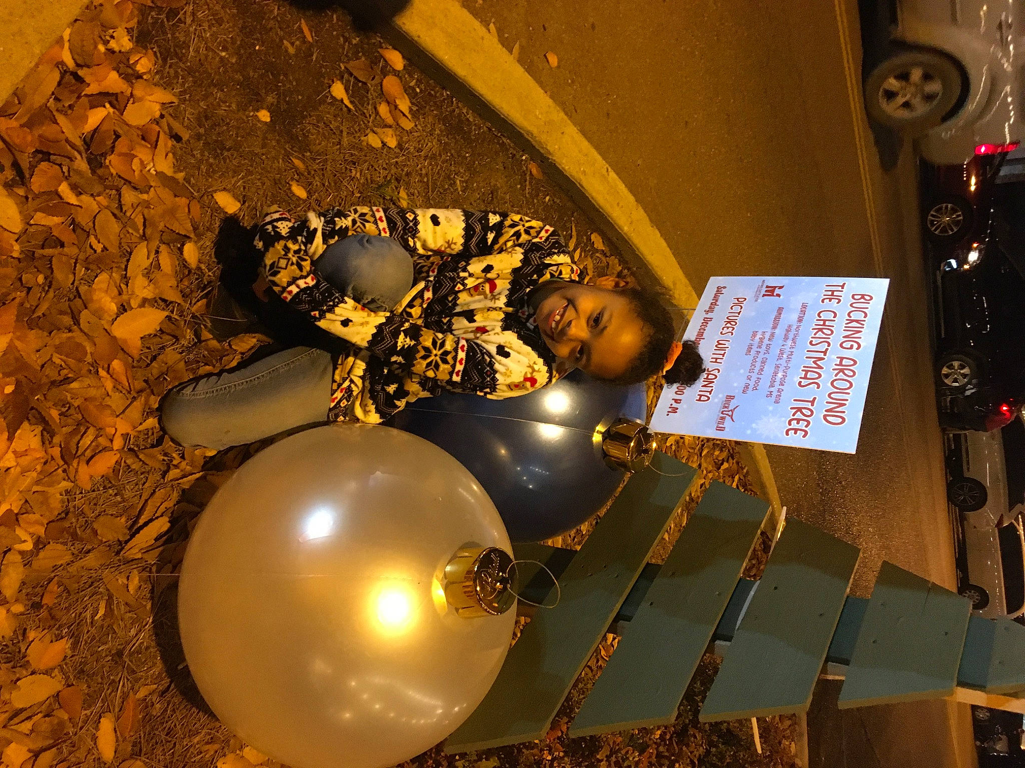 Anna joined the competition — help win amazing prizes! art, automotive_tire, ceiling, christmas_decoration, circle, font, handwriting, interior_design, joy, light, light_bulb, light_fixture, lighting_accessory, metal, motor_vehicle, ornament, person, space, tire, visual_arts