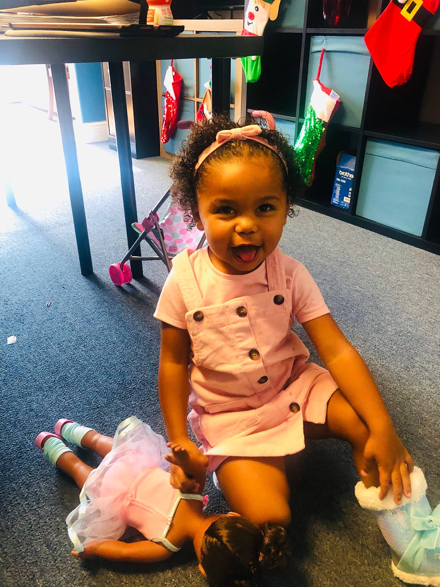 Aiyanna joined the competition — help win amazing prizes! baby, baby_toddler_clothing, child, event, flooring, fun, happy, human_leg, knee, leg, leisure, person, photograph, room, sandal, skin, smile, snapshot, television, thigh