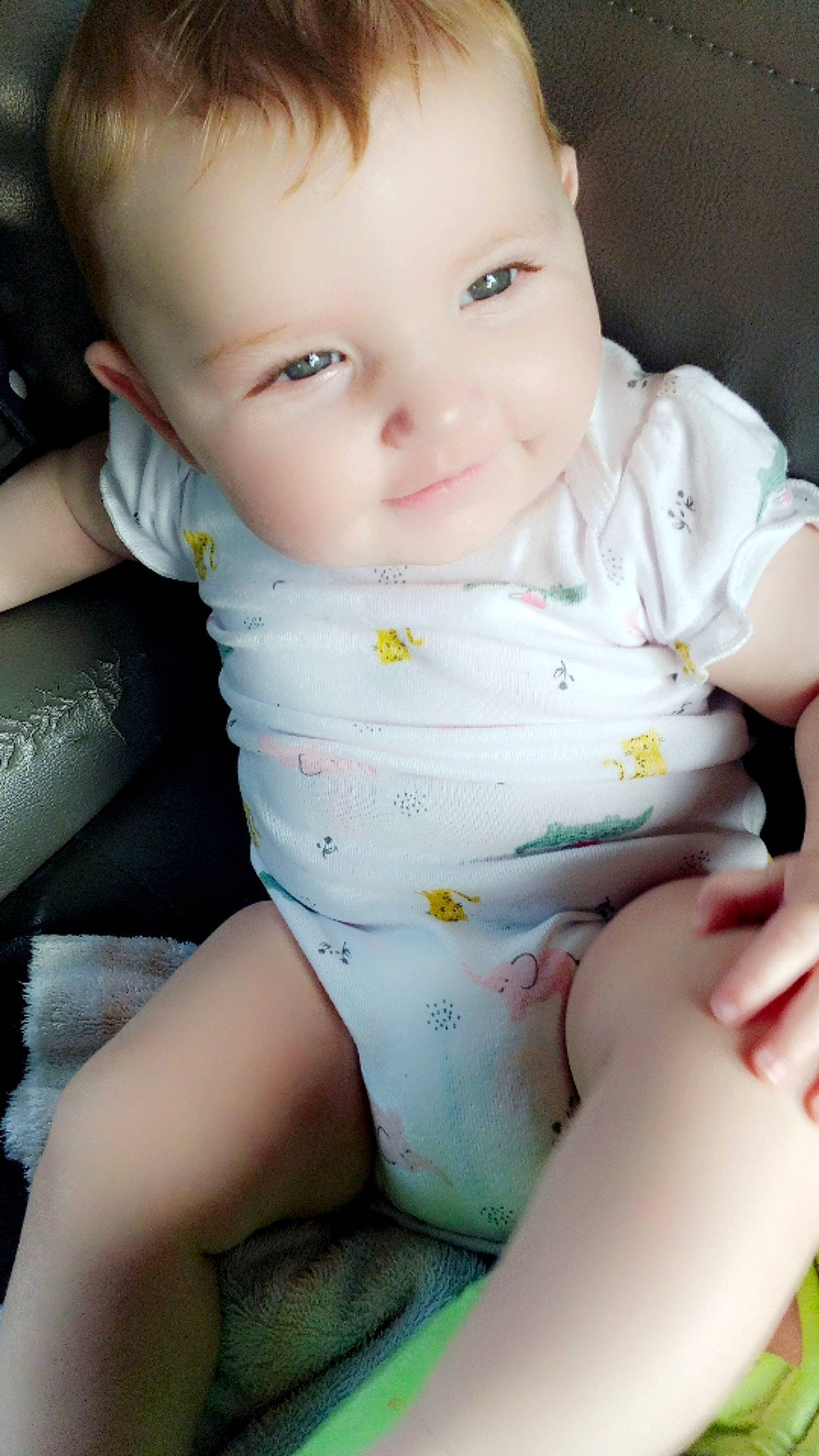 Lainey is registered to the contest to win money with this photo: baby, baby_toddler_clothing, cheek, chin, comfort, elbow, finger, hand, head, human_body, iris, leg, lip, mouth, neck, nose, person, skin, sleeve, stomach