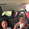 Layal is registered to the contest to win money with this photo: baby, car_headrest, car_interior, car_seat, child, children, clothing, cute, family, hair, happy, infant, mickey_mouse, mirror, portrait, seat, seatbelt, smiling, toddler, window