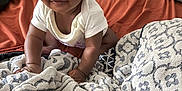 Ariana Durodola is registered to the contest to win money with this photo: baby, bed, blanket, child, clothing, comfort, crawling, curly_hair, cute, indoors, infant, pattern, person, pillow, portrait, small_hands, smile, soft_texture, white_shirt, young_child